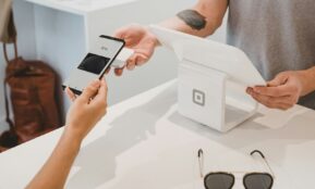 person holding black Android smartphone close-up photography