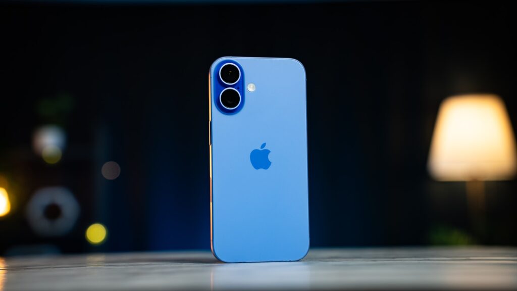 A blue iPhone case sitting on top of a table