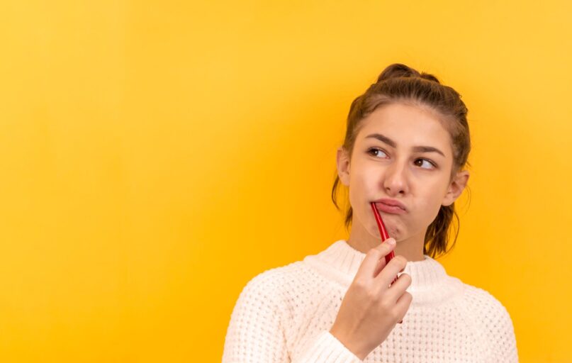 woman in white and black checkered dress shirt