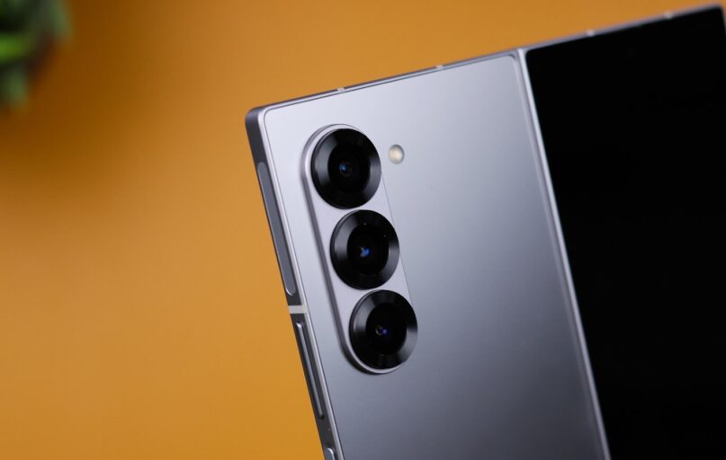 A close up of a cell phone on a table