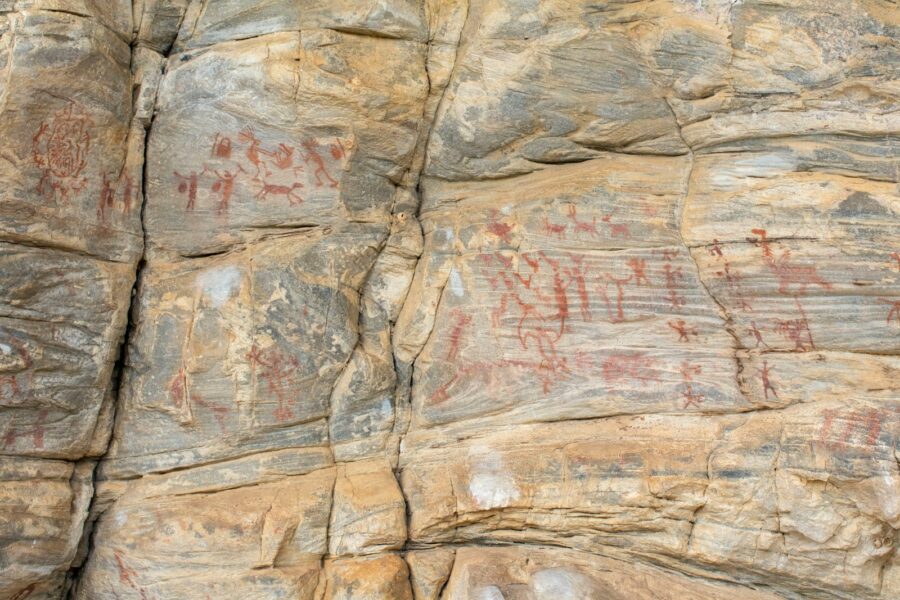 a large rock with some writing on it
