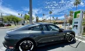 black sedan on road during daytime