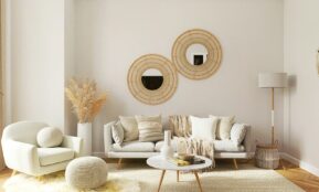 a living room filled with furniture and a mirror