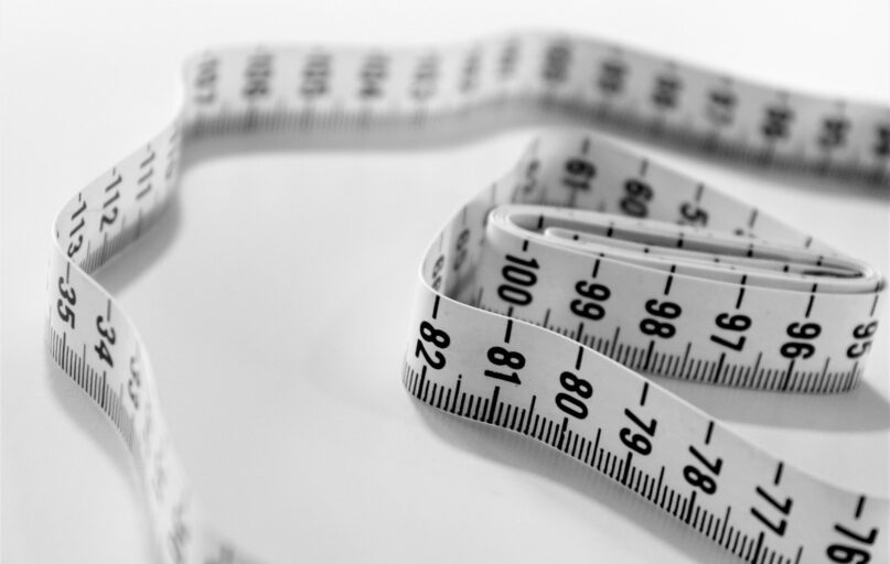 selective focus photography of tape measure