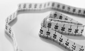 selective focus photography of tape measure