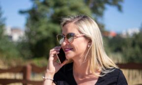 woman in black tank top wearing black framed eyeglasses
