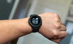 person wearing black digital watch