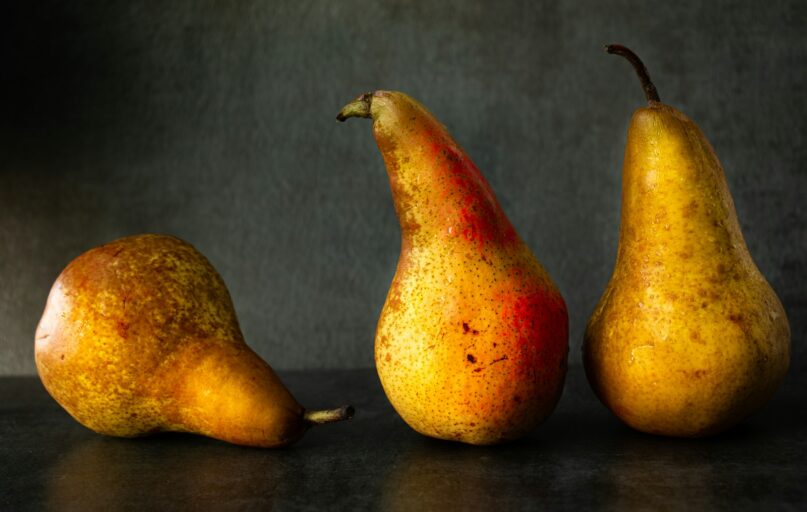 3 yellow and red fruits