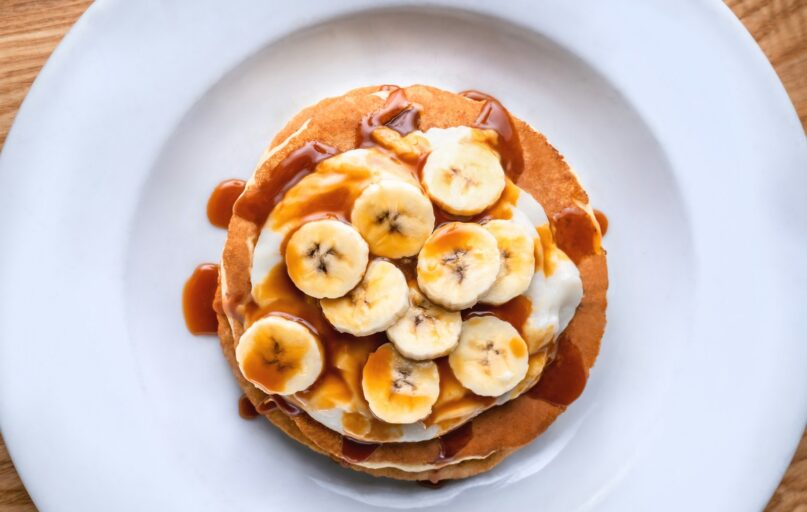 brown and white bread on white ceramic plate