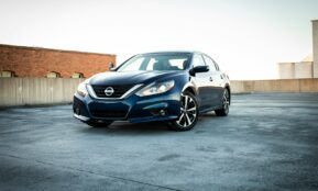 white bmw m 3 coupe parked on gray concrete pavement during daytime