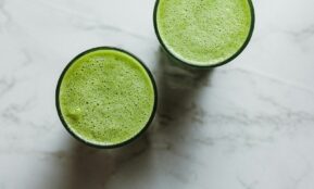 2 round green ceramic bowls