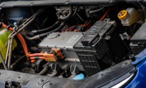 Electric car engine with visible wiring and battery components