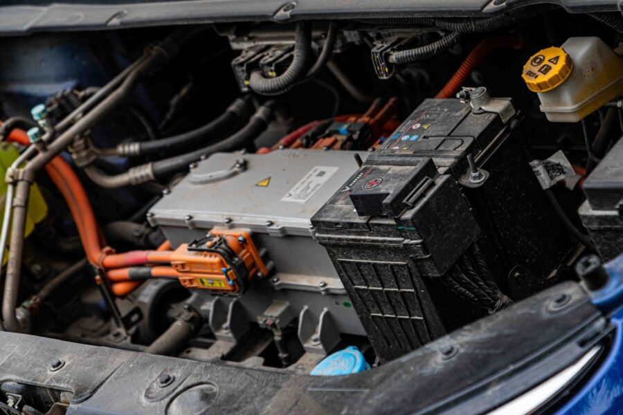 Electric car engine with visible wiring and battery components