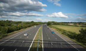 a highway with cars on it