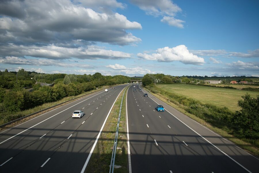 a highway with cars on it