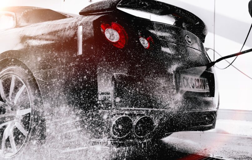 grayscale photo of black car