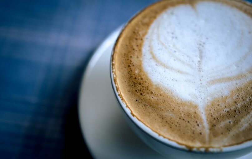 white ceramic mug with coffee