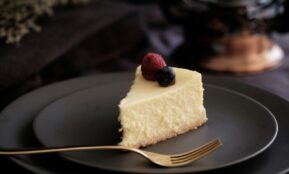 sliced of cake on black plate