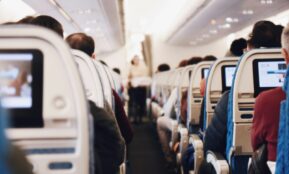 shallow focus photography of people inside of passenger plane