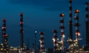 red and white tower under blue sky during night time