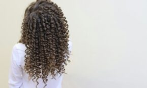 a woman with a large braid