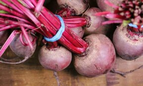 turnips on brown wooden surface