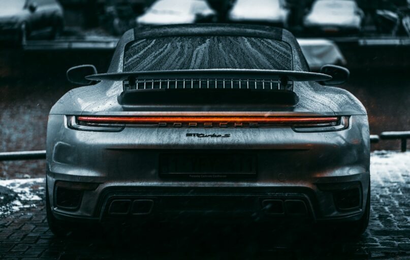 black car in grayscale photography