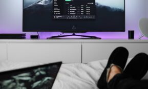 flat screen TV turned on