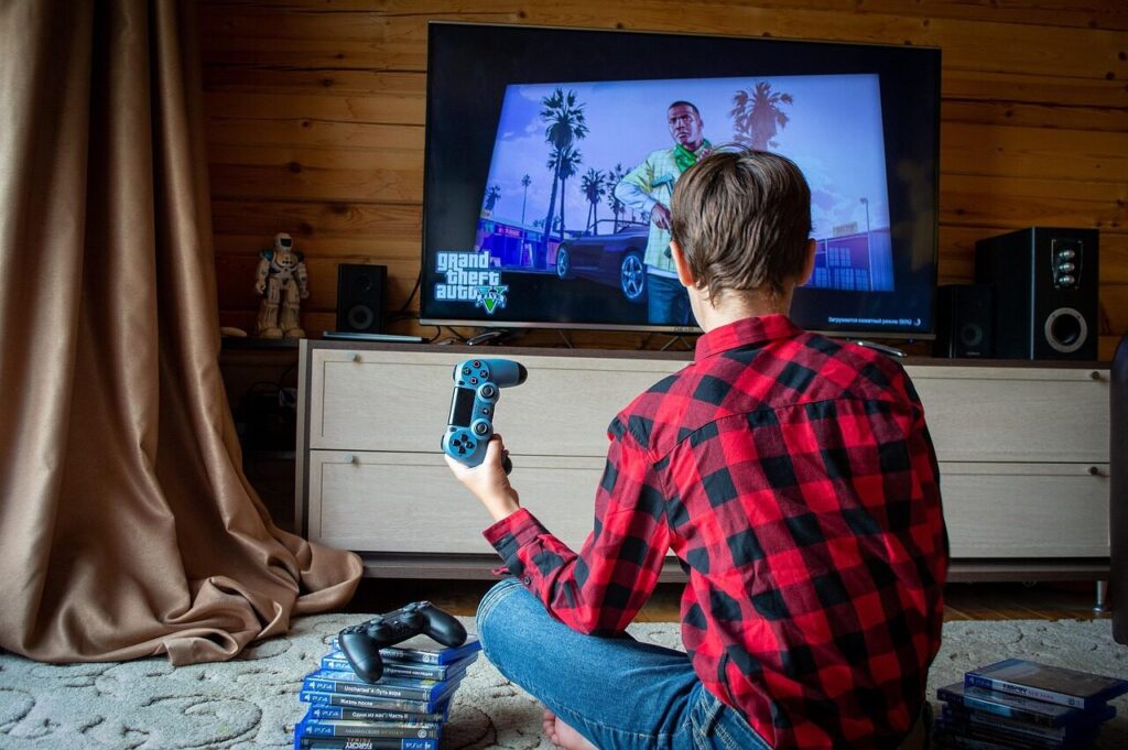 Vaikinas žaidžia GTA. Pixabay nuotr.